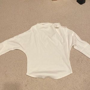 White sweater. "Fuji thermal" from Free People. We The Free brand.